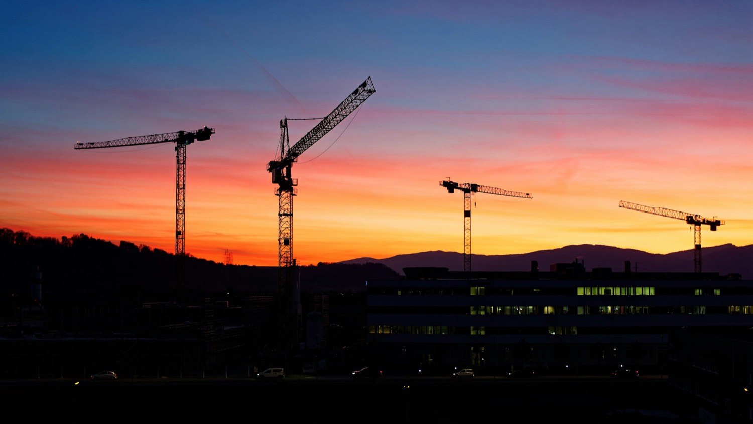 Steel framework rising against the sky